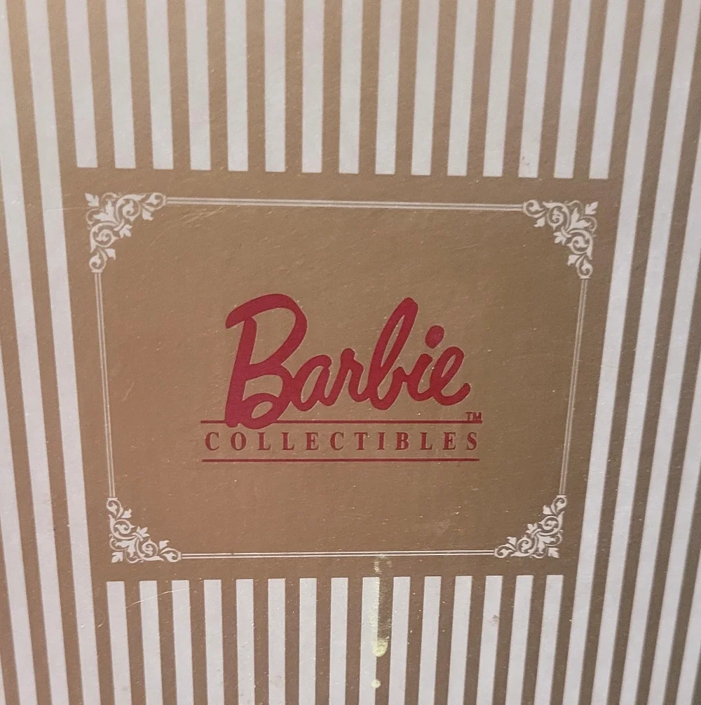 Hallmark Holiday Traditions Limited Edition Porcelain Barbie Figurine.